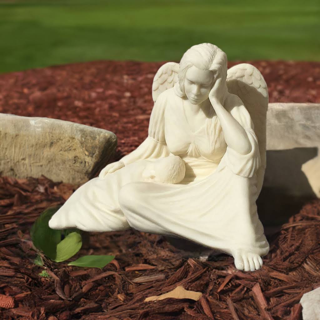 garden statue of woman with baby contemplating, graceful serene