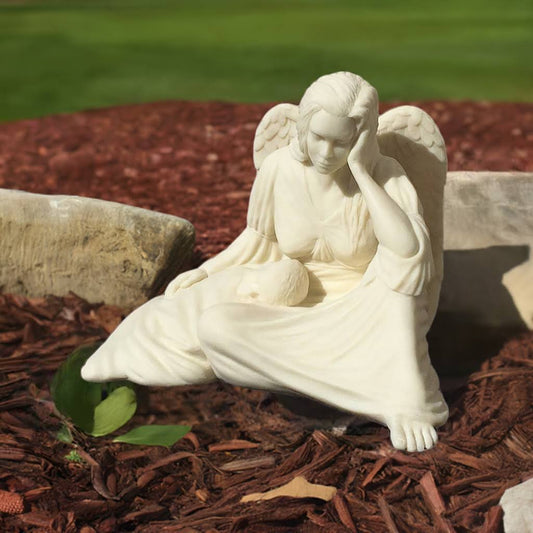 garden statue of woman with baby contemplating, graceful serene