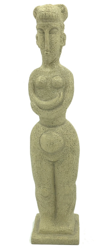A sculpture of a standing abstract block shaped nude female figure with an elongated facial expression. Reproduced after works by Modigliani.