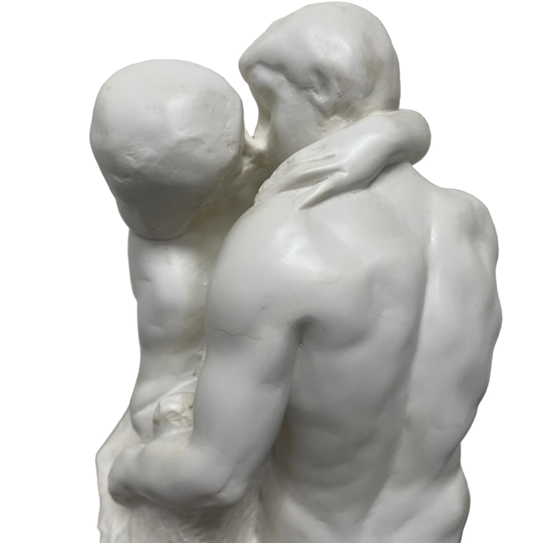 White 10-inch Rodin The Kiss sculpture showing embracing lovers.